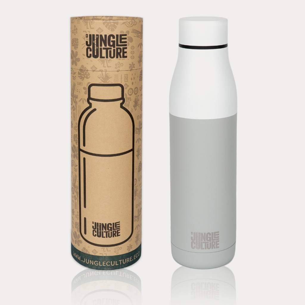 Insulated stainless steel water bottle standing upright on work desk with display box