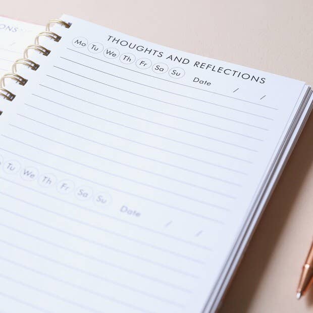 Close-up of spiral binding and high-quality interior pages