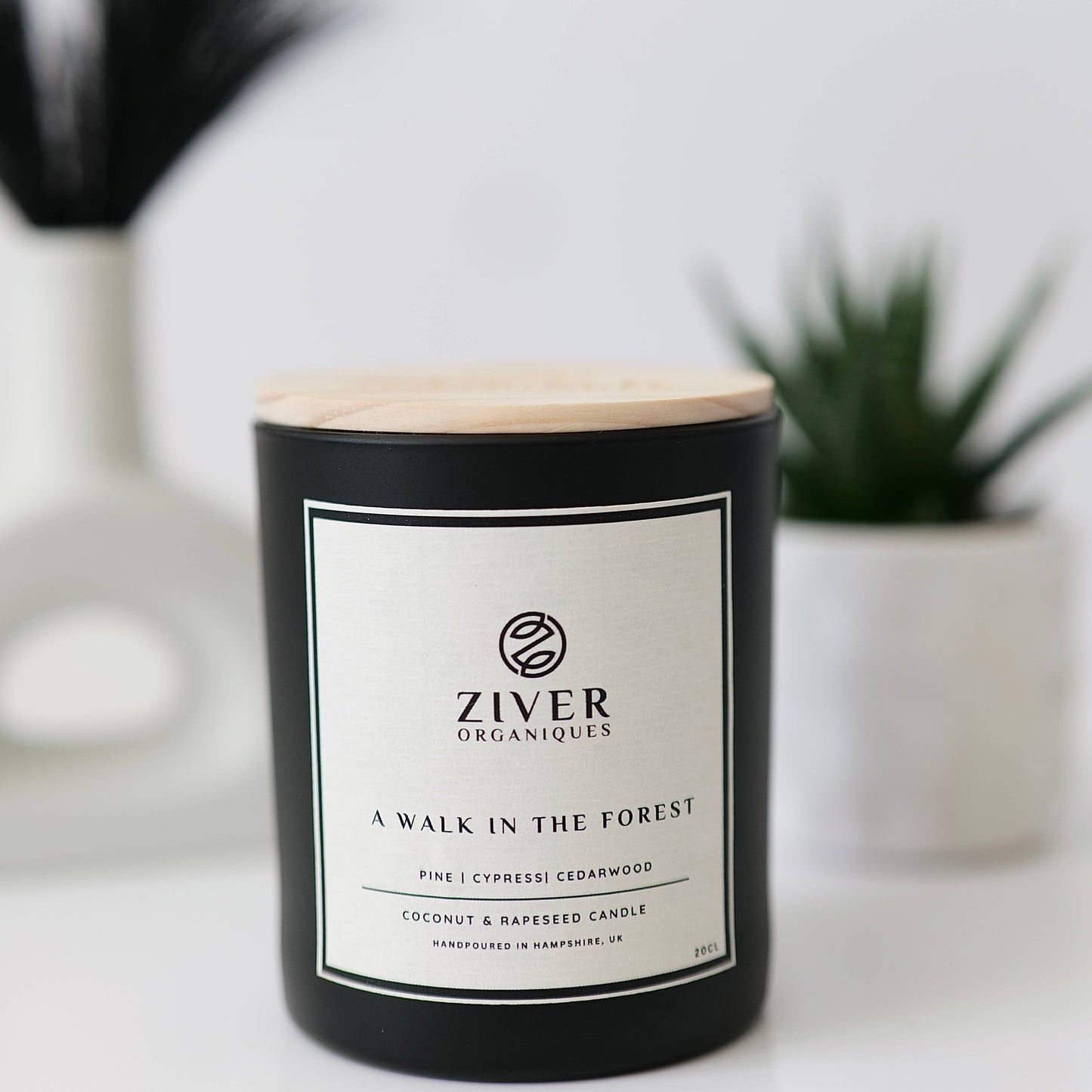Lid On Cedarwood pine and cypress candle in glass jar on kitchen surface