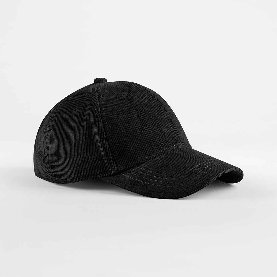 Black Organic corduroy baseball cap in neutral tone with pre-curved peak