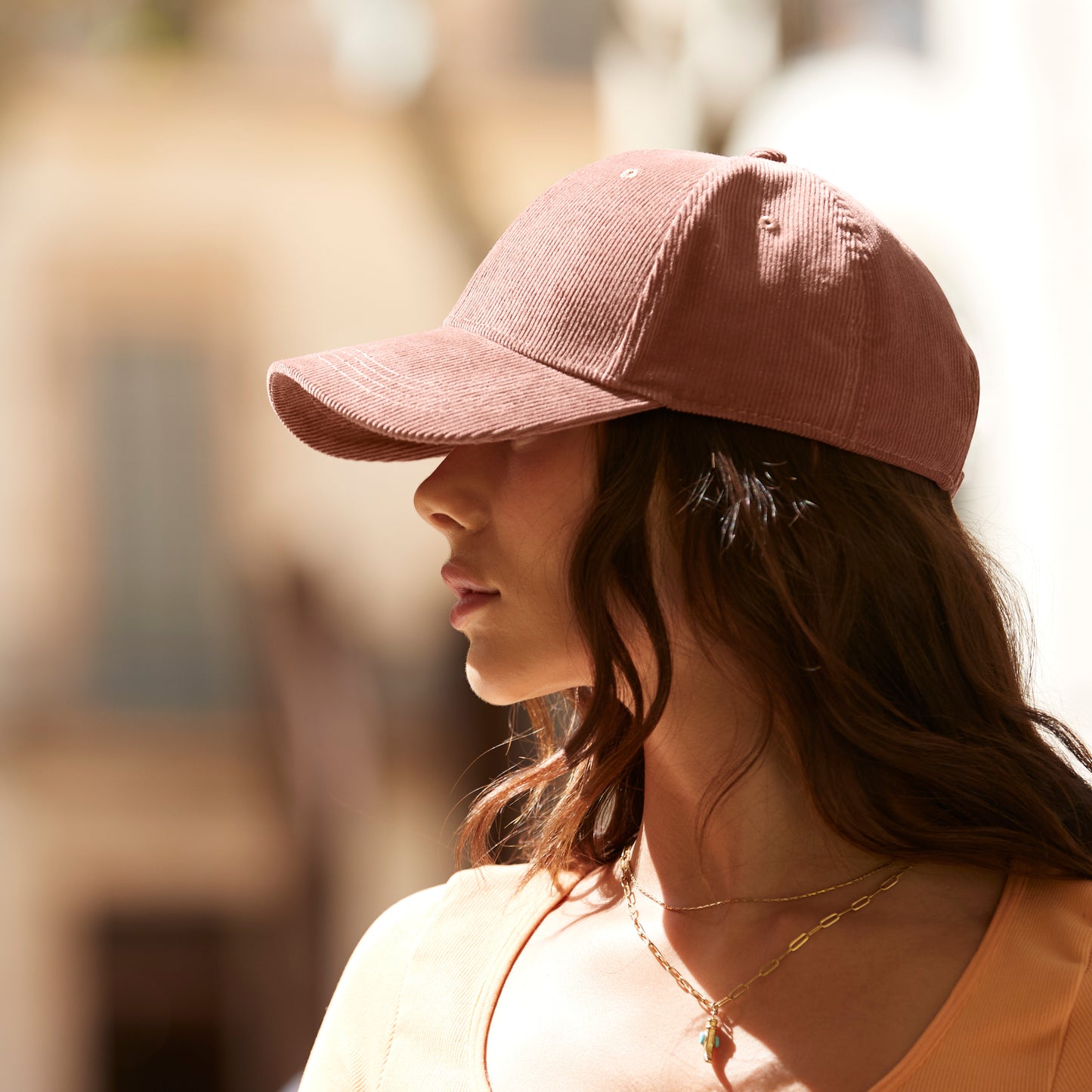 Organic corduroy baseball cap in neutral tone with pre-curved peak