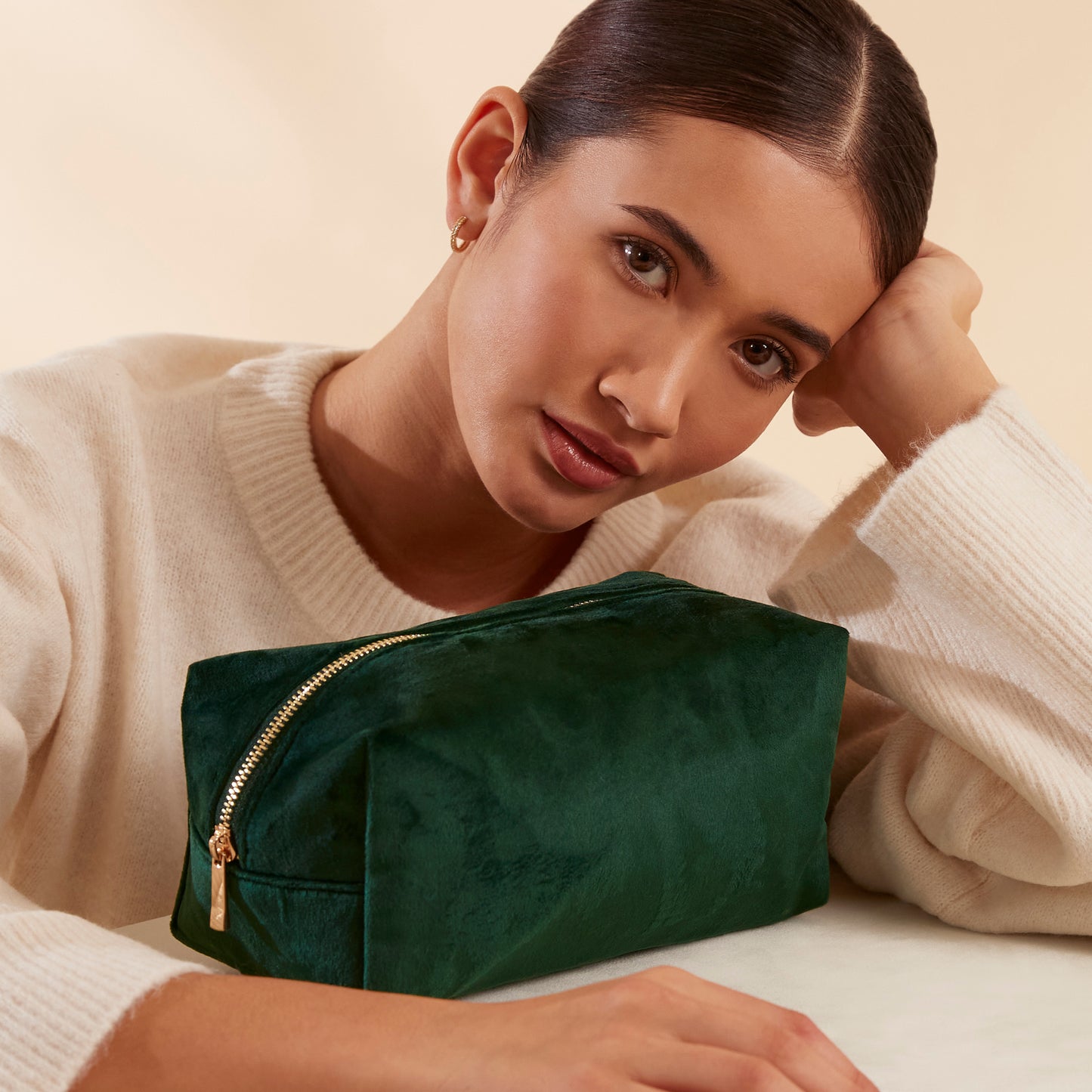 Luxury velvet toiletry bag in rich colour with gold zip