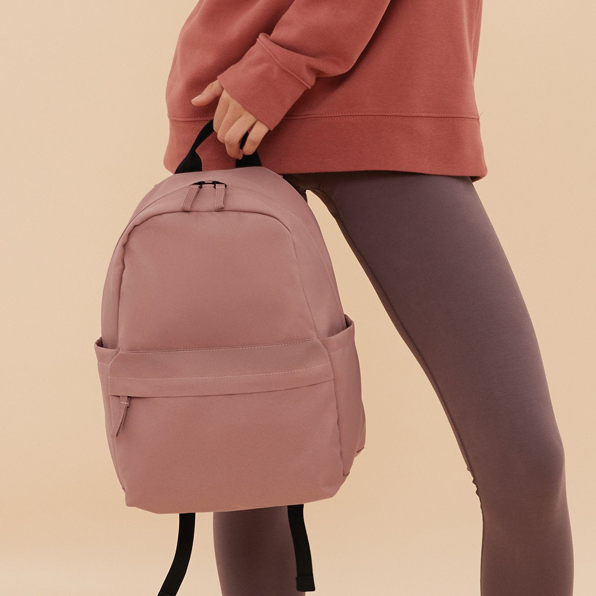 Lifestyle everyday mini backpack in neutral colour with zip pocket