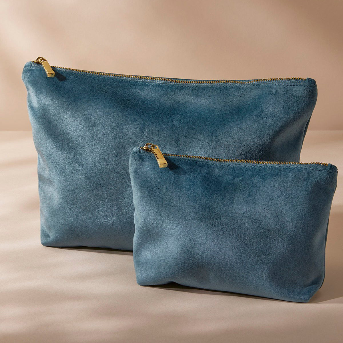 Two sizes of velvet pouch in coordinating colours