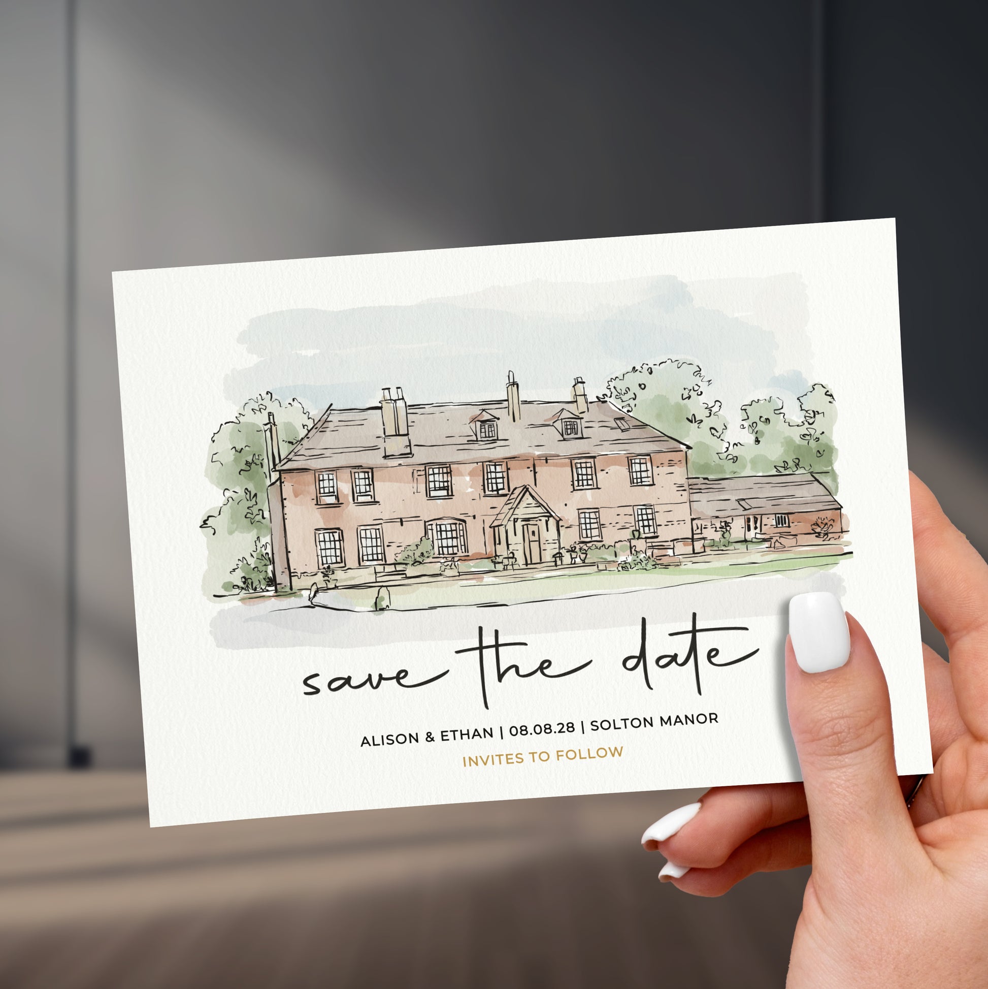 colour venue illustration save the date card held in a hand with painted white names, held up against a stylish sleek room background