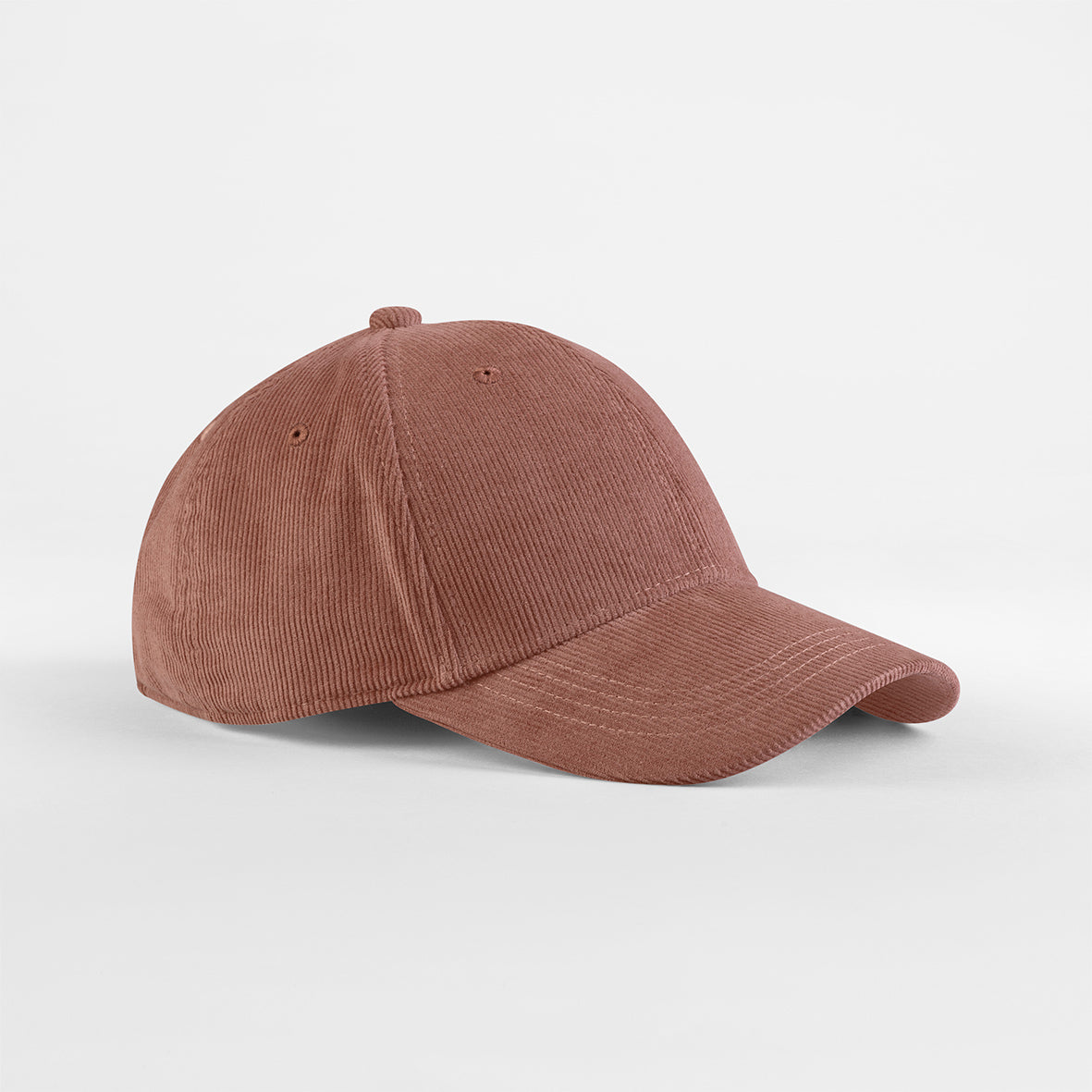 Side View of Organic corduroy baseball cap in neutral tone with pre-curved peak