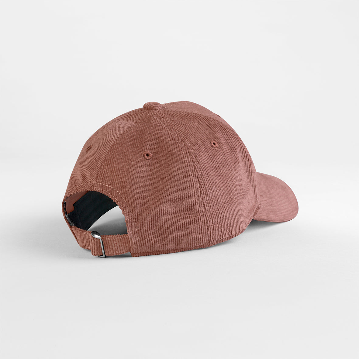 Neutral-toned cap with sustainable fashion tags visible