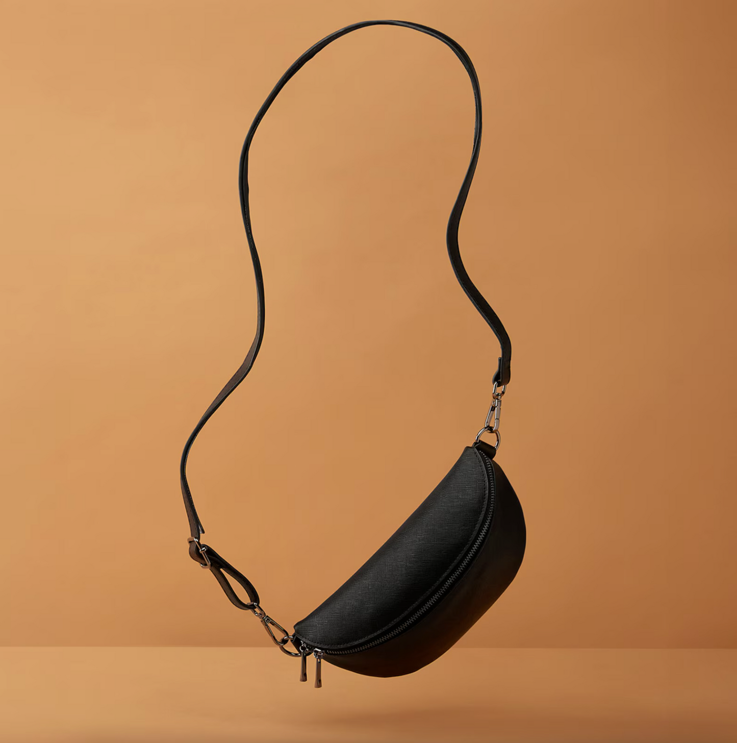 black fanny pack worn across chest – hands-free styling