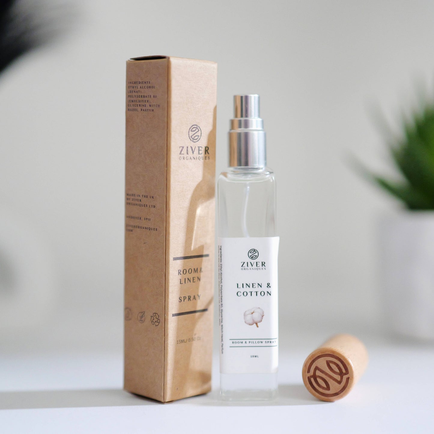 Fresh Linen room spray in glass bottle with soft towels in background