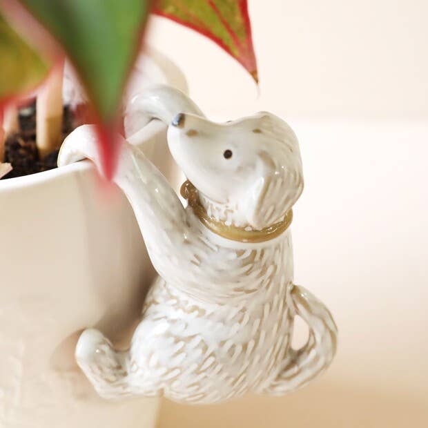 Close-up of ceramic dog ornament with textured fur and cute expression