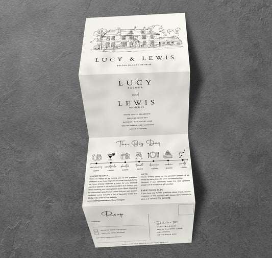 black and white venue sketch design all in one concertina wedding invitations flat lay on a styled surface