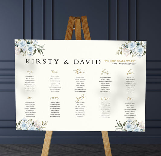 blue roses wedding Table Plan on a brown easel in a stylish room in a wedding venue