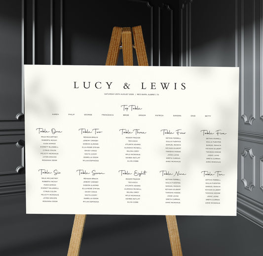minimalist wedding Table Plan on a brown easel in a stylish room in a wedding venue