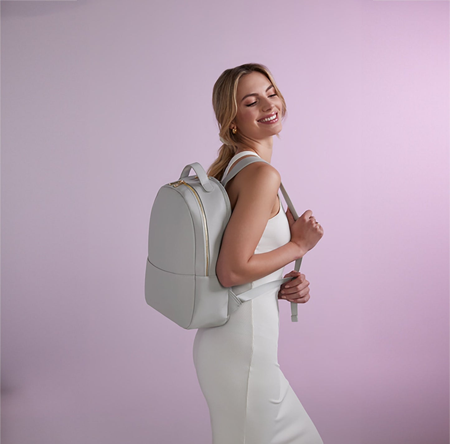 Woman wearing Stylish personalised gift set including backpack and matching items