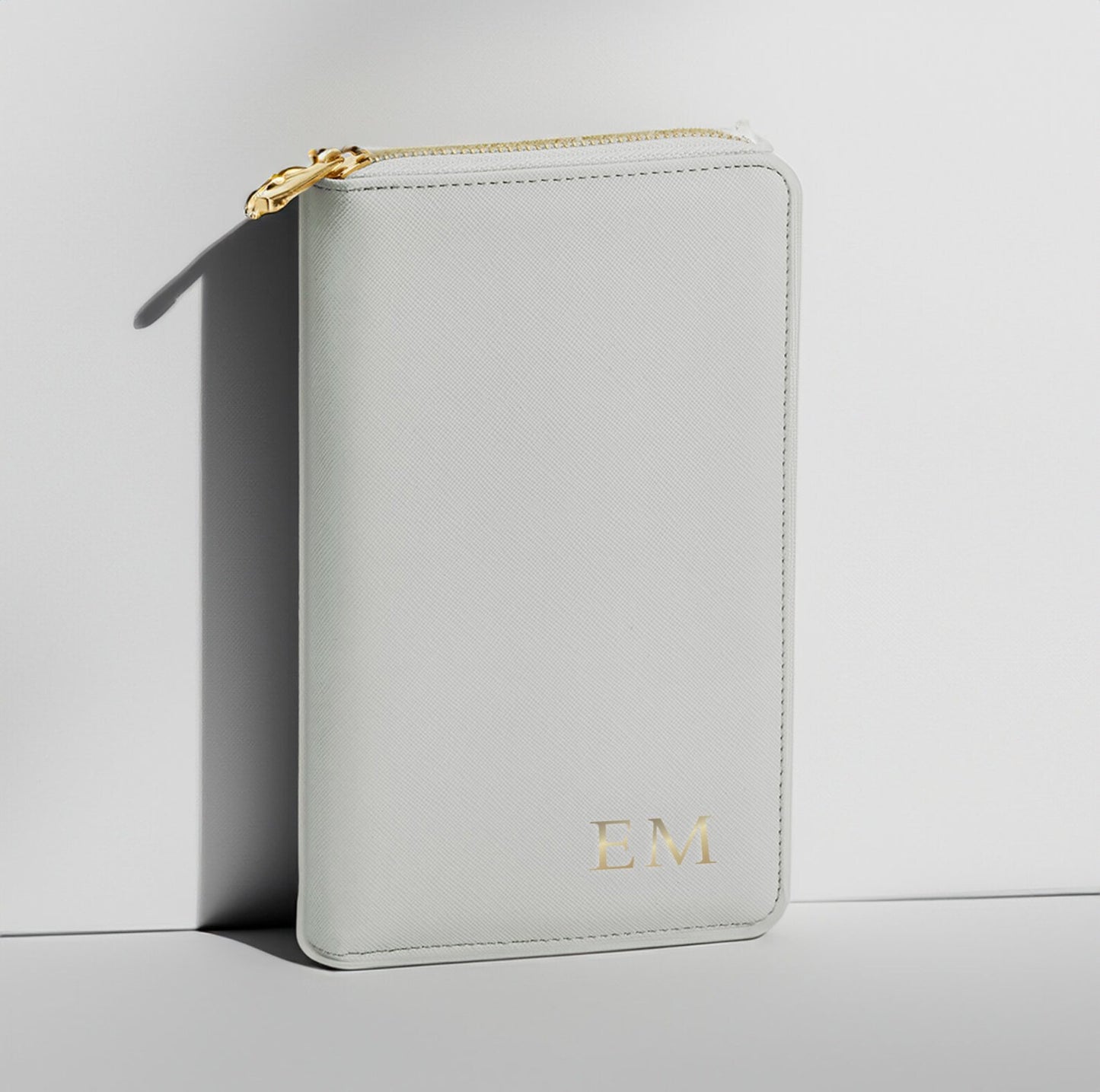 Grey Personalised jewellery travel case with gold initials on faux leather purse-style design