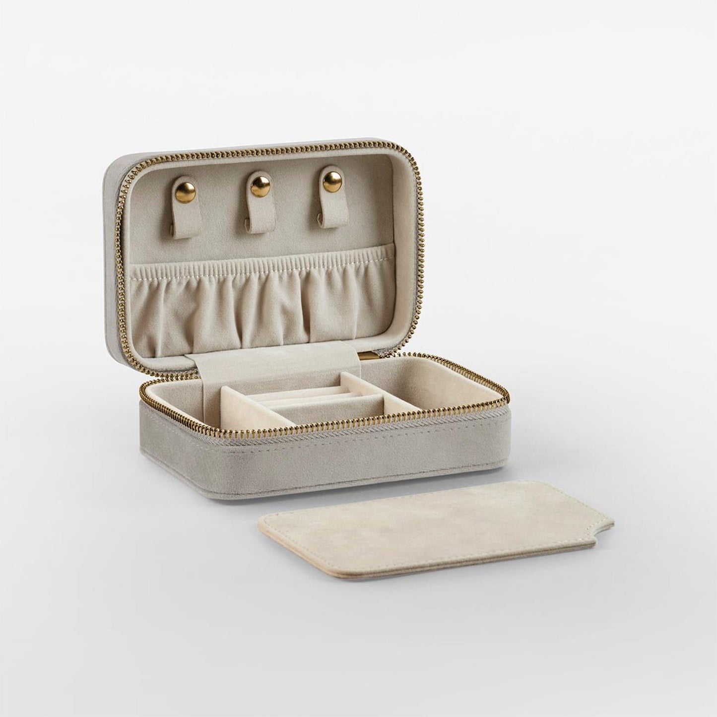 Stacked jewel-toned jewellery boxes for travel or gifting