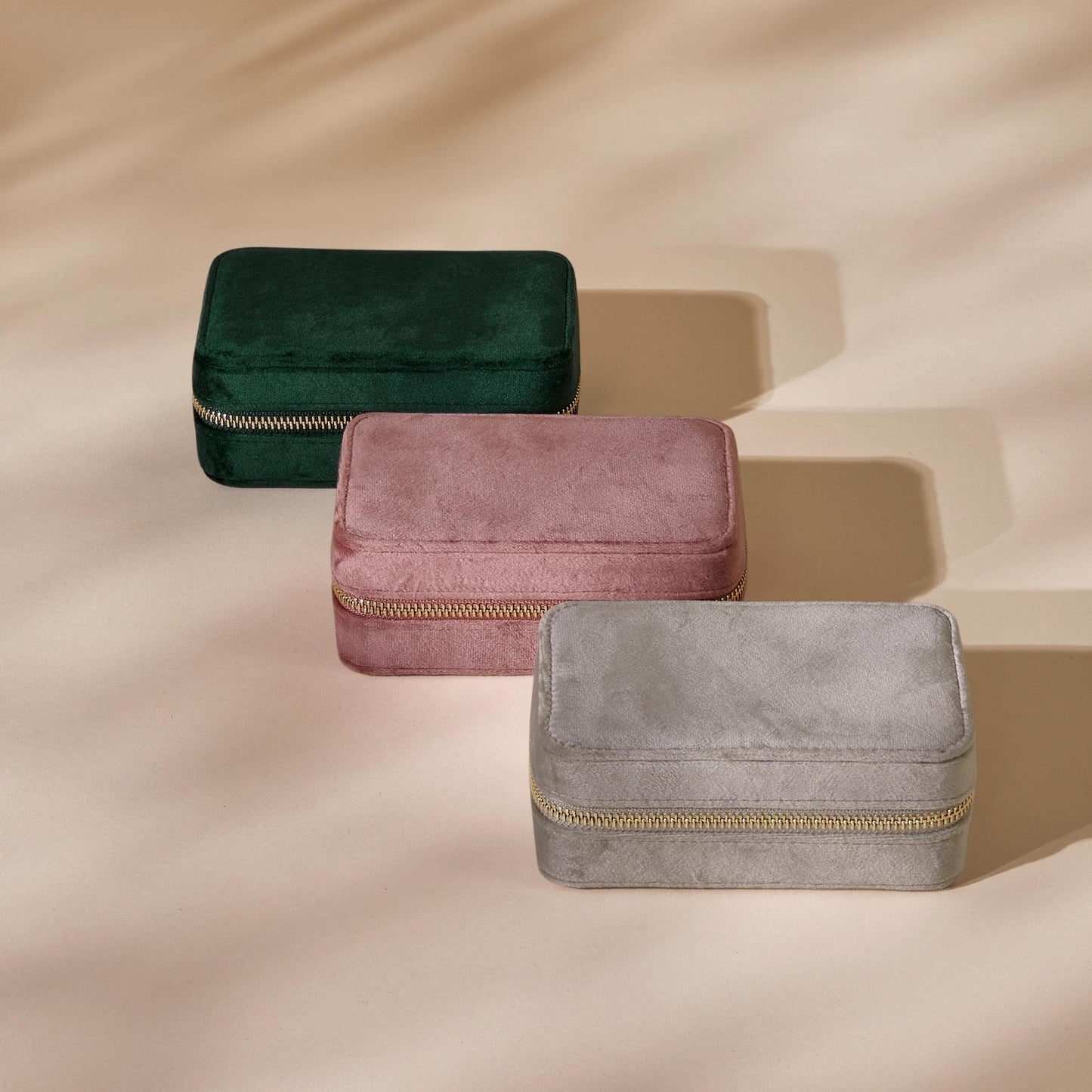 Velvet travel jewellery box in rich jewel-tone with zip closure