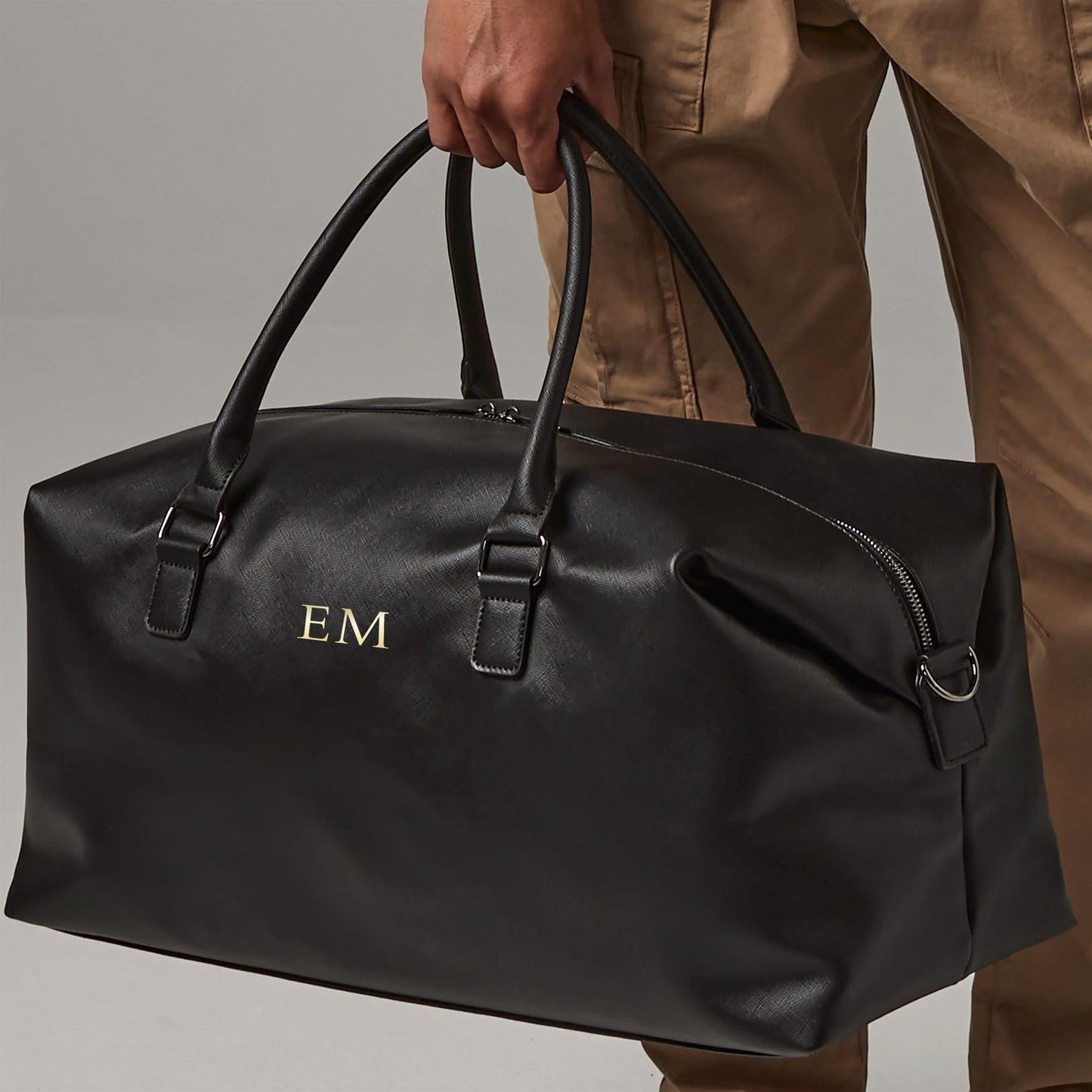 Faux leather holdall bag for men with gold zip and sturdy handles