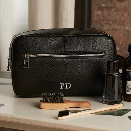 Personalised wash bag in faux leather with silver initials on front