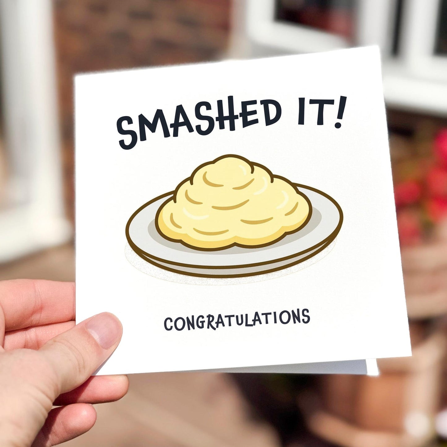 Funny card featuring a plate of mashed potato with the text ‘Smashed It’.