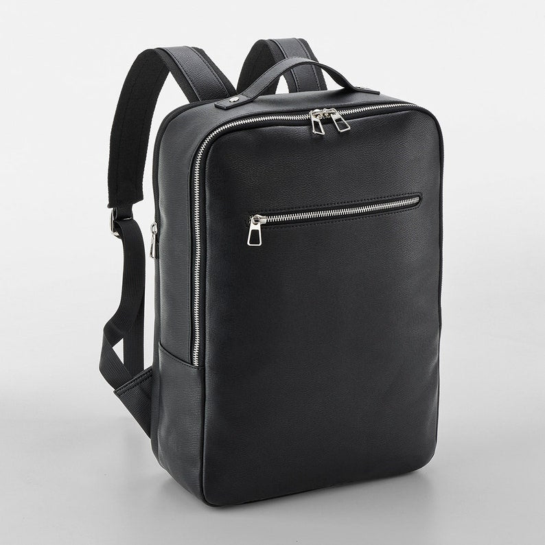 Workday essentials flat lay with personalised laptop bag