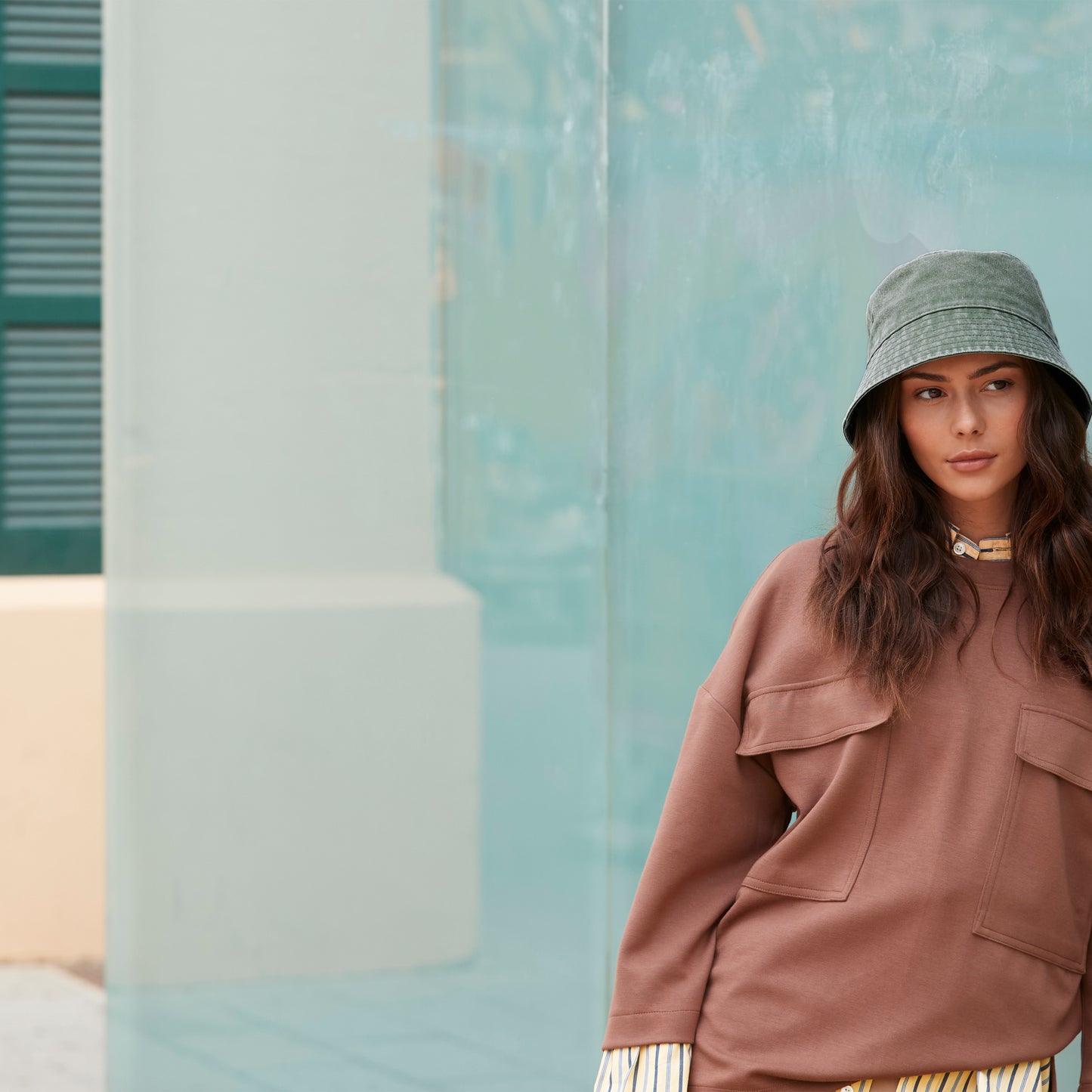 Model wearing Vintage cotton bucket hat with wide brim in neutral colour