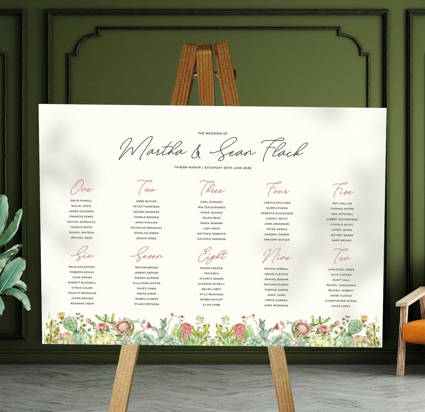 succulent and cactus wedding Table Plan on a brown easel in a stylish room in a wedding venue