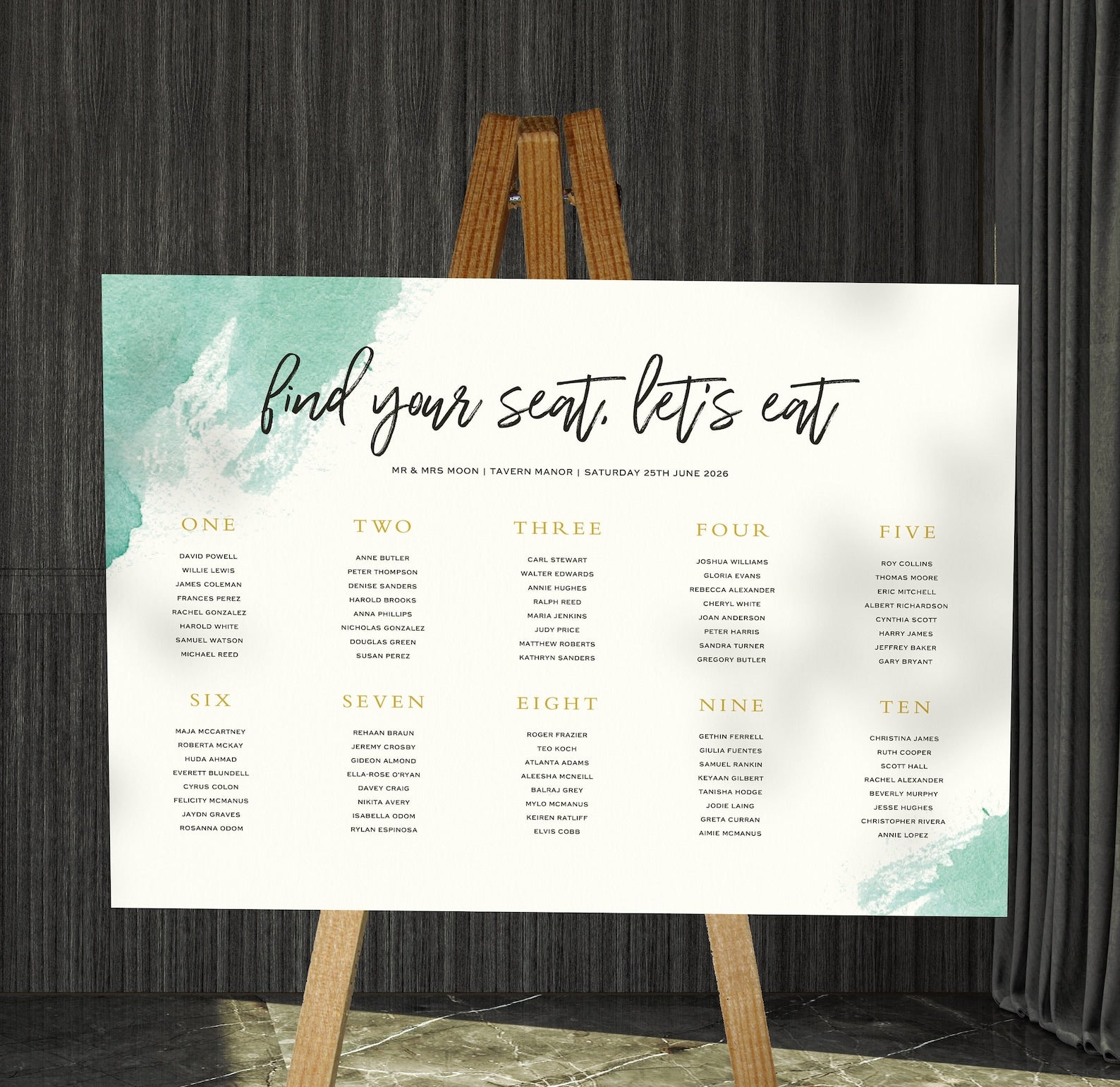 teal watercolour wedding Table Plan on a brown easel in a stylish room in a wedding venue