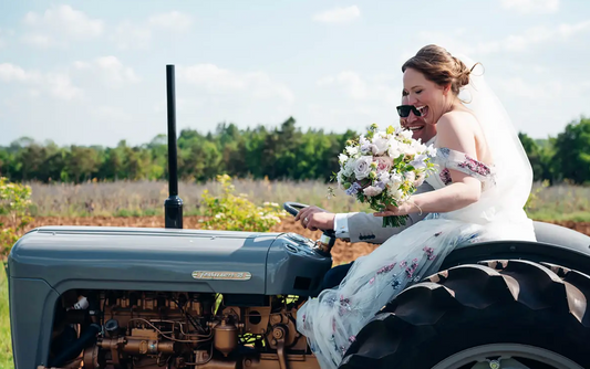 bride and groom in tractor