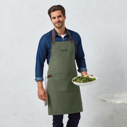 Monogrammed apron with black initial printed on moss green cotton

