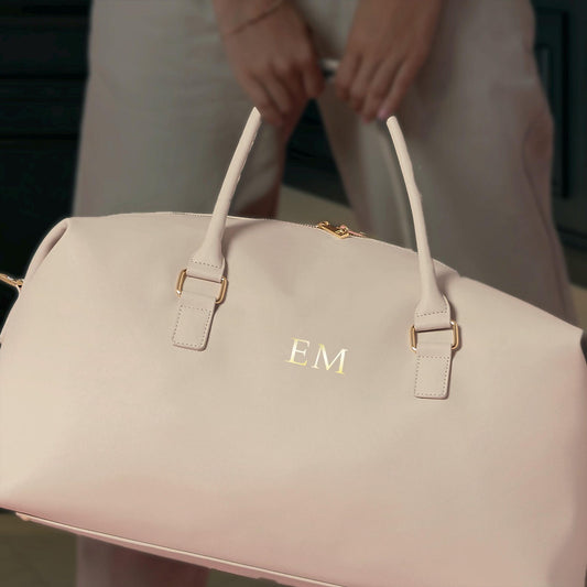 Personalised faux leather weekender bag with monogrammed initials