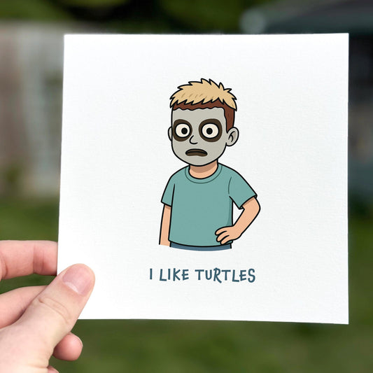 Funny greeting card showing a cartoon boy with face paint and the text ‘I like turtles’.