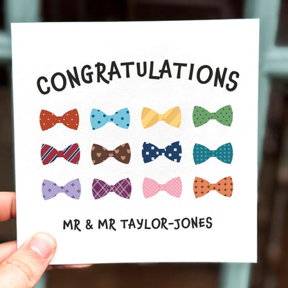 Wedding congratulations card featuring a pattern of colourful bow ties with the text ‘Congratulations’.