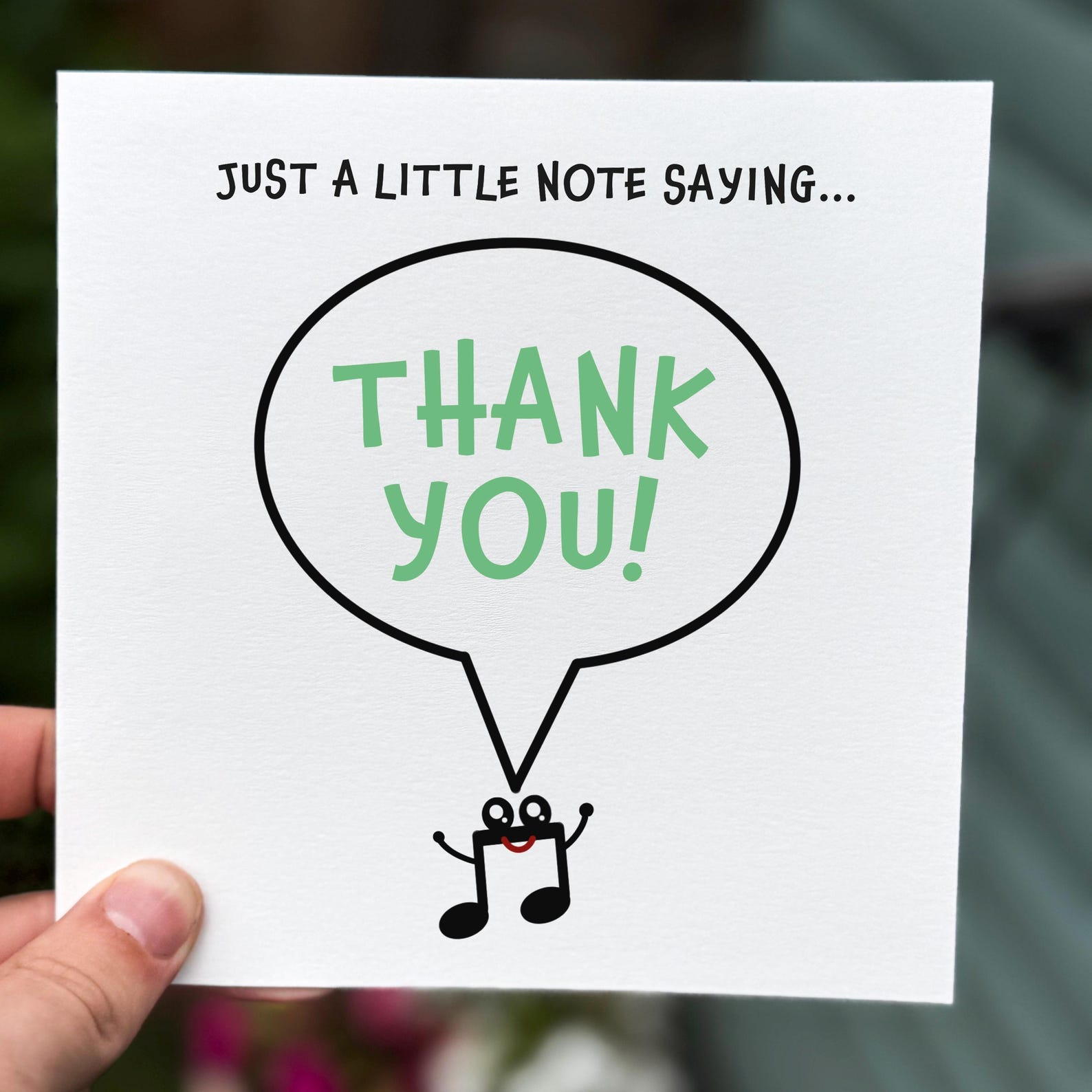 Thank you card featuring a smiling music note with a speech bubble reading ‘Thank You’.