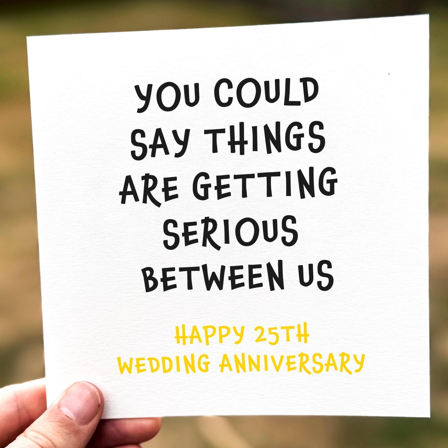 Funny anniversary card with playful typography reading ‘You Could Say Things Are Getting Serious Between Us’.