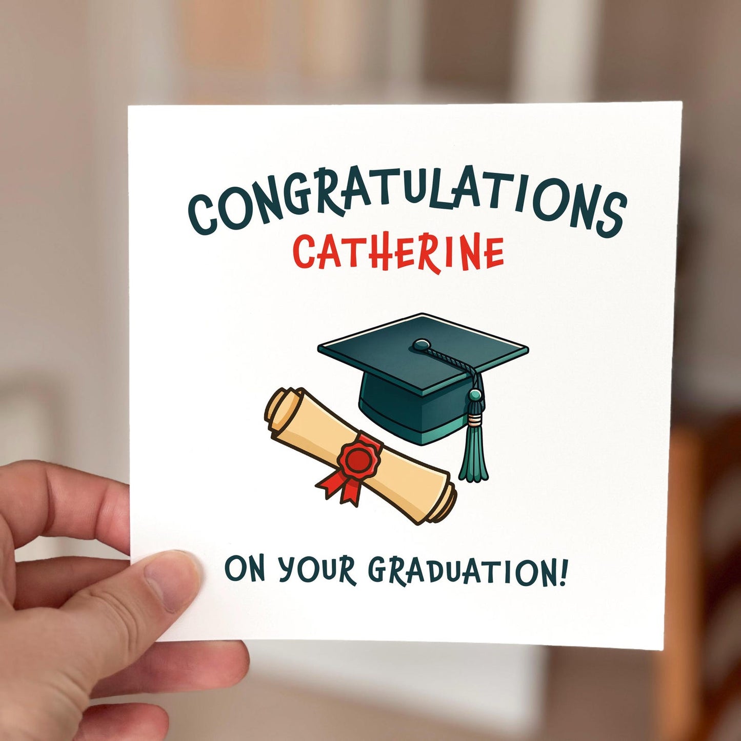 Graduation card featuring a cap and diploma illustration with text ‘Congratulations On Your Graduation’.