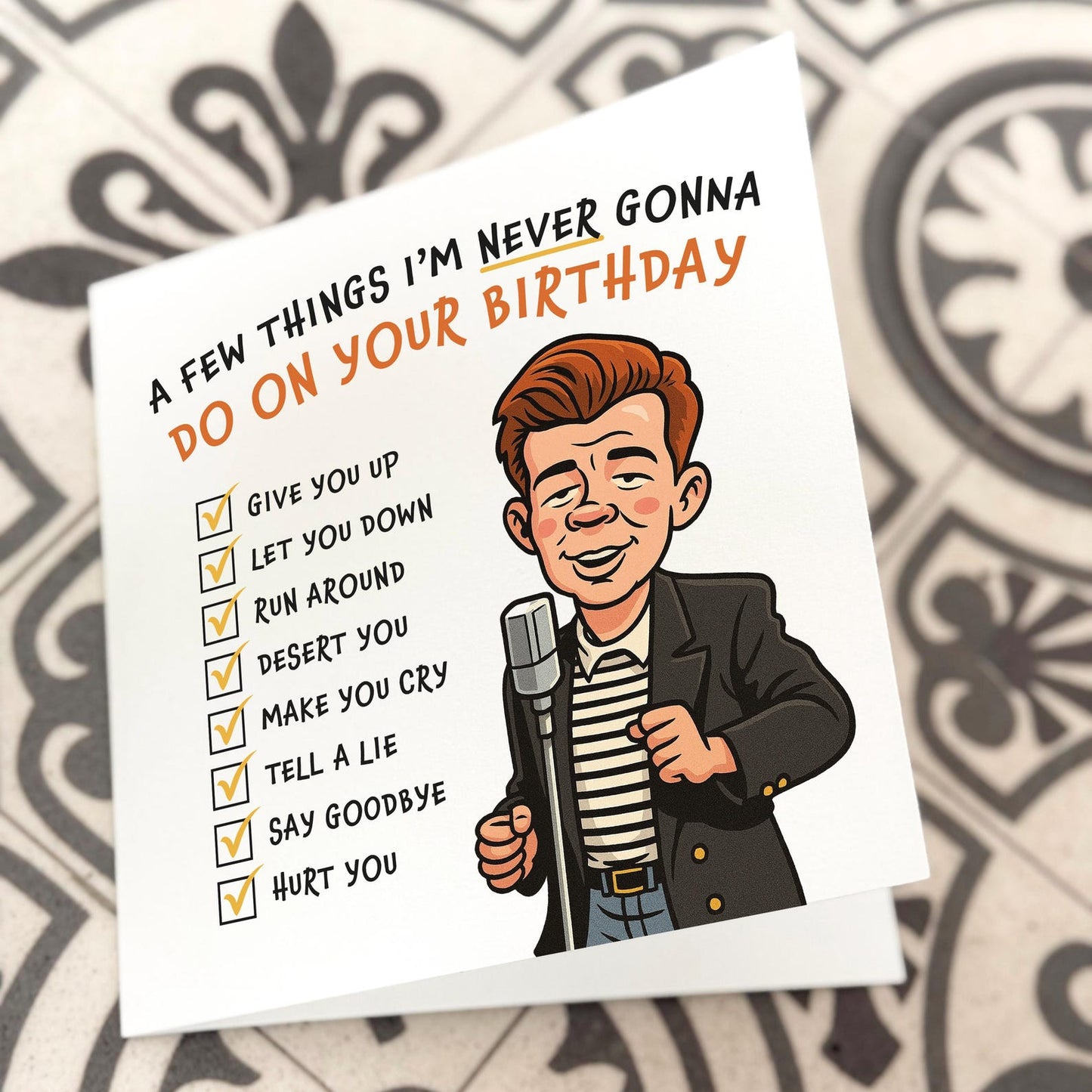 Funny birthday card featuring a cartoon singer with checklist of lyrics from ‘Never Gonna Give You Up’.