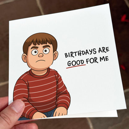 Funny cartoon birthday card showing a grumpy boy in a red striped jumper with the text ‘Birthdays are good for me’.