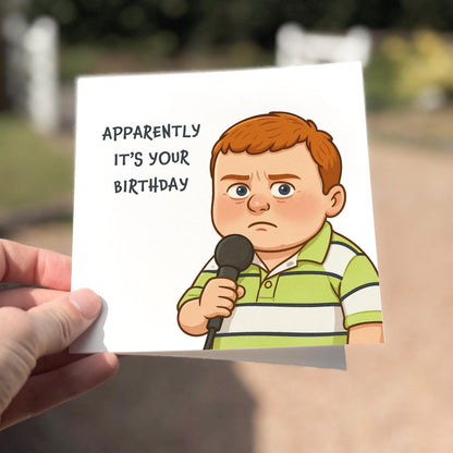 Funny cartoon birthday card showing a boy in a striped green polo holding a microphone with the quote ‘Apparently it’s your birthday’.
