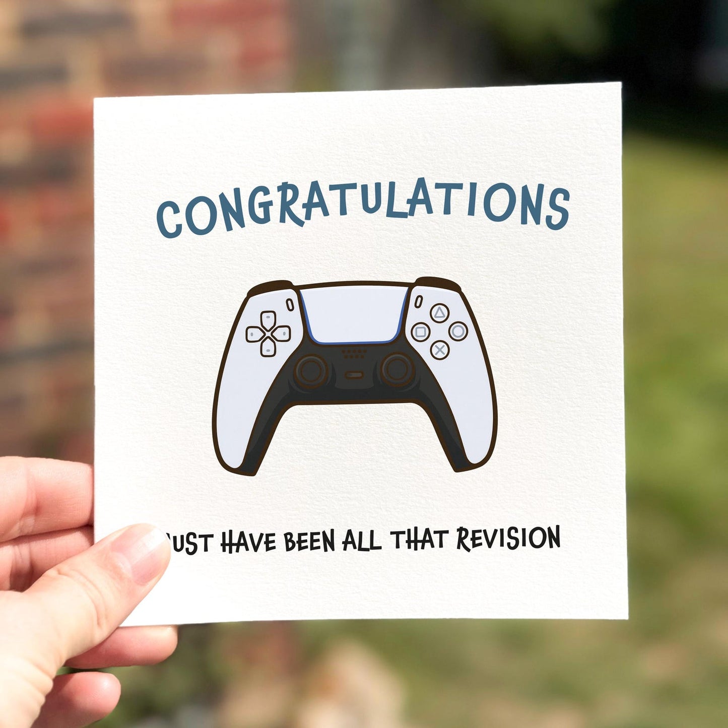 Funny congratulations card featuring a game controller and the text ‘Must Have Been All That Revision’.