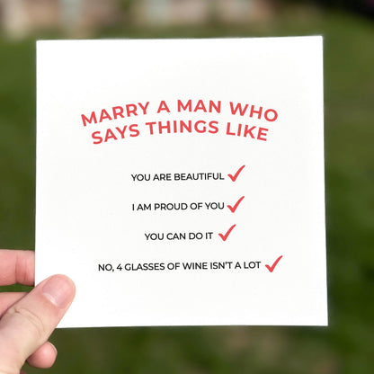 Funny relationship card featuring red checklist phrases about love, pride and humour.