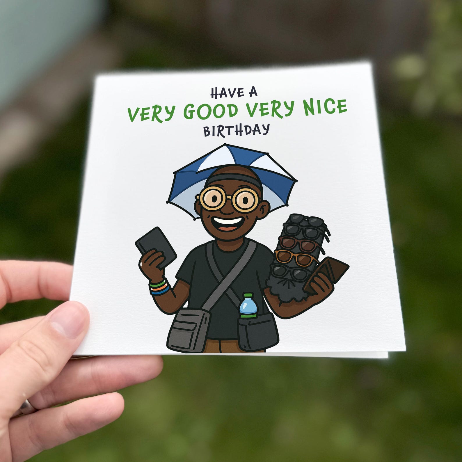 Funny birthday card showing a smiling cartoon vendor with sunglasses and an umbrella hat holding gifts with the text ‘Have a very good very nice birthday’.