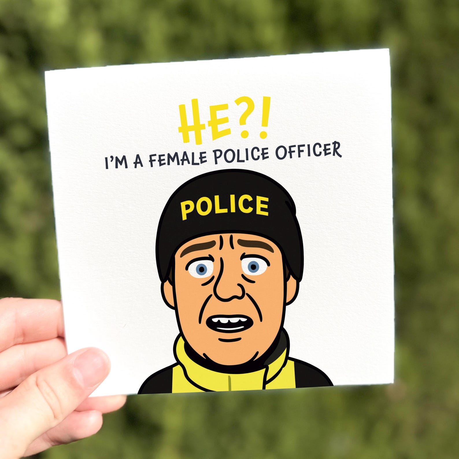 Funny meme greeting card showing a shocked cartoon police officer saying ‘He?! I’m a female police officer!’.
