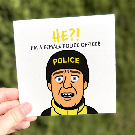 Funny meme greeting card showing a shocked cartoon police officer saying ‘He?! I’m a female police officer!’.