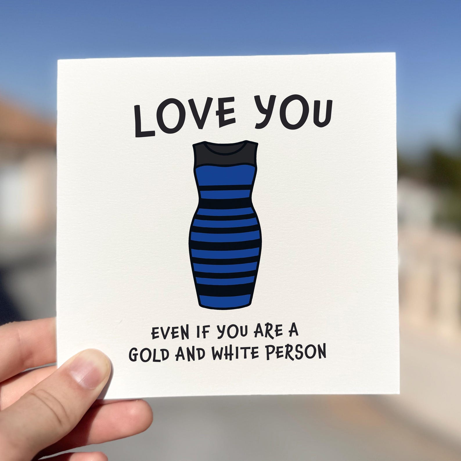 Funny love card featuring the blue and black dress with text ‘Love You Even If You Are A Gold And White Person’.