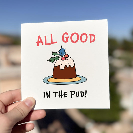 Funny festive card featuring a Christmas pudding illustration with the phrase ‘All Good In The Pud’.