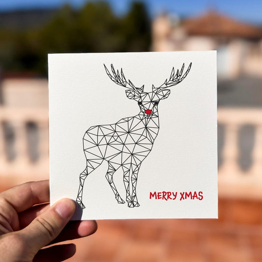 Modern Christmas card featuring a geometric reindeer with red nose and the text ‘Merry Xmas’.