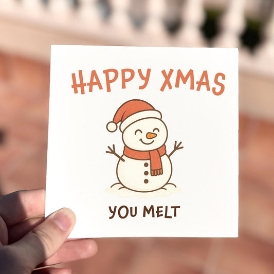 Funny Christmas card featuring a smiling snowman and the text ‘Happy Xmas You Melt’.