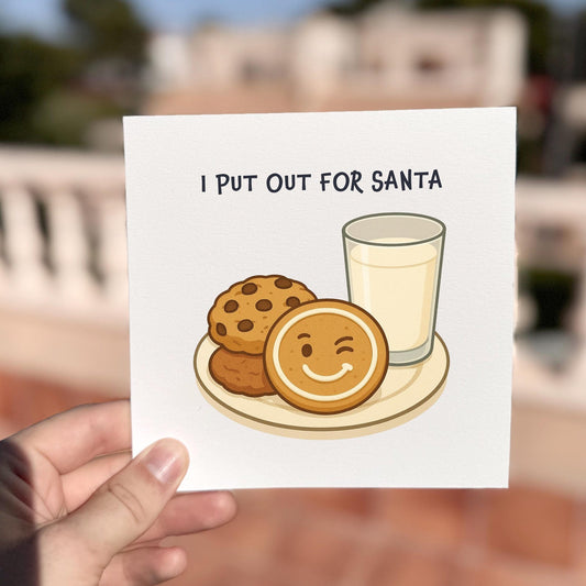 Funny Christmas card featuring cookies and milk with the phrase ‘I Put Out For Santa’.